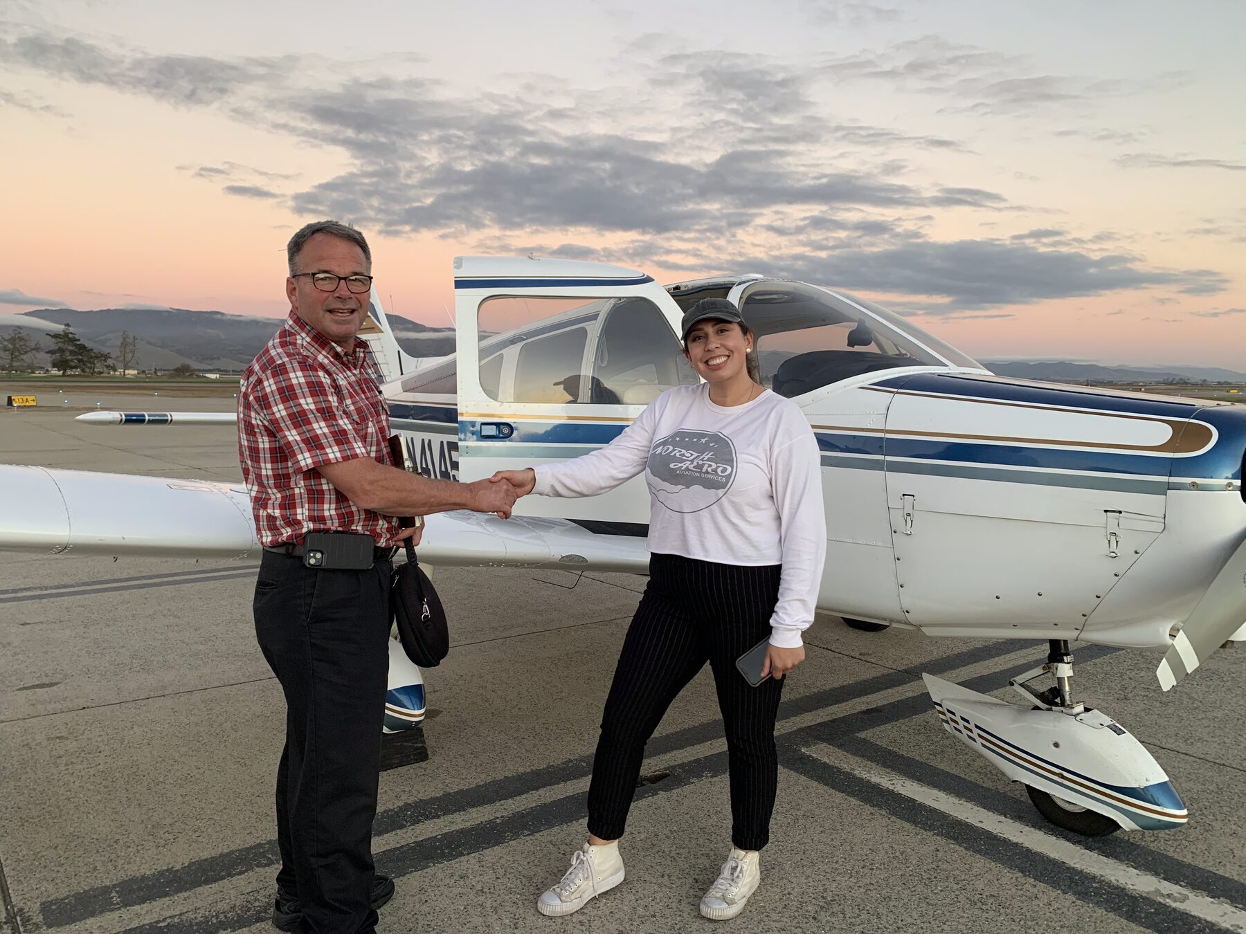 Checkride handshake at sunset on the Salinas ramp